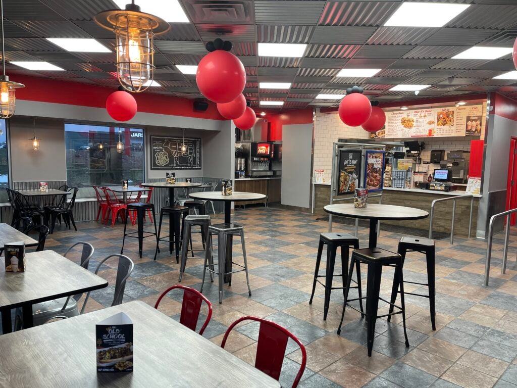The counter and dining area at Charleys Cheesesteaks and Wings in Flint, MI during their grand opening in December 2022.